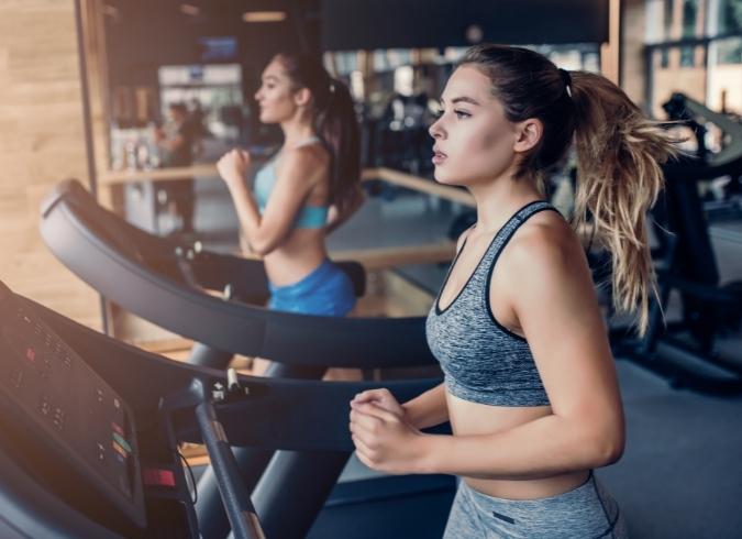 Bay Parc Apartments - Miami, FL - Women running on treadmill